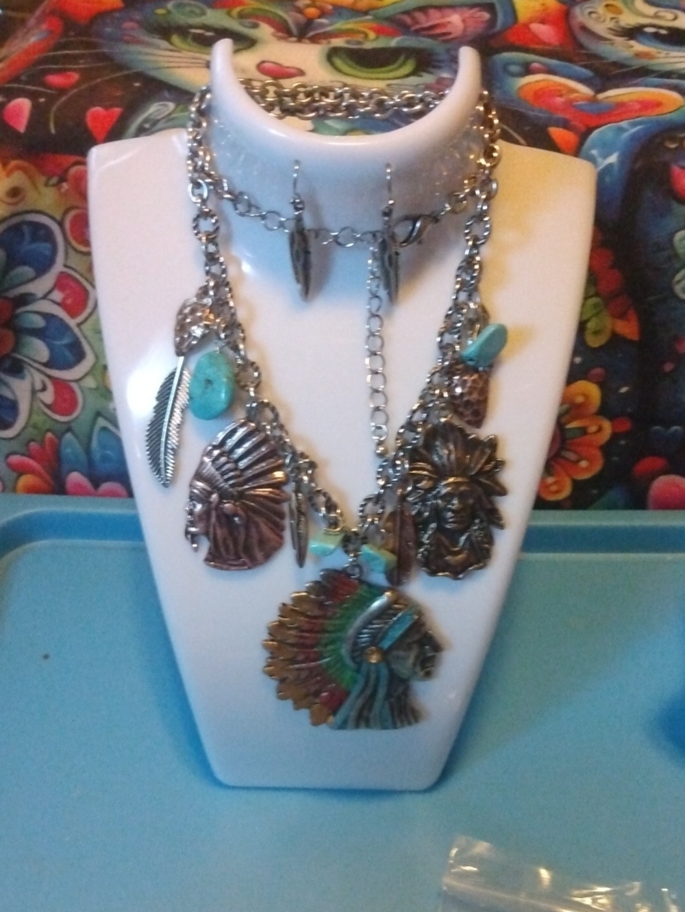 Silver-Tone Multi-Charm Necklace with Turquoise Accents